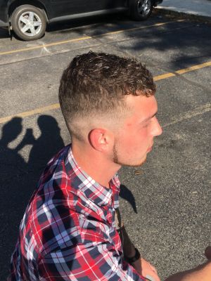 Men's haircut by Sarah DeJong at Pure Vanity in Holland, MI 49424 on Frizo