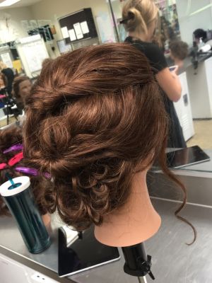 Updo by Marissa Lenz at Tricoci University of Beauty Culture in Libertyville, IL 60048 on Frizo