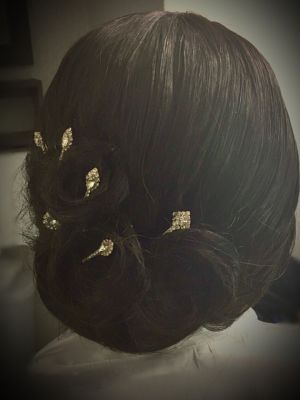 Bridal hair by Lauren Anderson at Hair Art Salon and Spa in Antioch, TN 37013 on Frizo