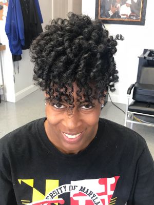 Updo by Jeannie Whitaker at NCCS in Baltimore, MD 21202 on Frizo