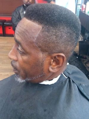 Men's haircut by Kameron Kutta at KUTS BY Kutta in Fayetteville, GA 30214 on Frizo