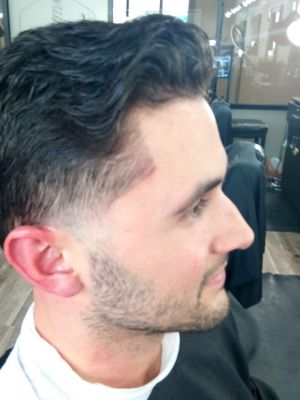 Men's haircut by Kameron Kutta at KUTS BY Kutta in Fayetteville, GA 30214 on Frizo