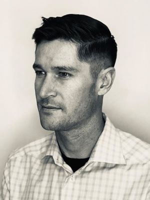 Men's haircut by Nicole Greer at Tribe Studio in Encinitas, CA 92024 on Frizo