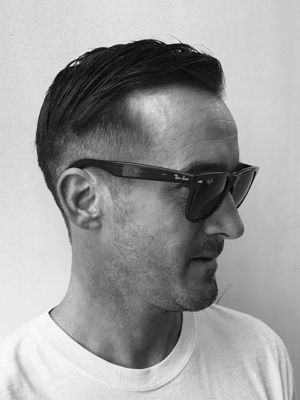 Men's haircut by Nicole Greer at Tribe Studio in Encinitas, CA 92024 on Frizo