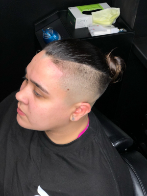 Women's haircut by Nicolette Leasure at Blades&Bottles in Modesto, CA 95354 on Frizo