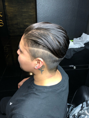 Women's haircut by Nicolette Leasure at Blades&Bottles in Modesto, CA 95354 on Frizo
