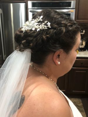 Bridal hair by Sam Smith at SamSmithStyle in Colorado Springs, CO 80911 on Frizo