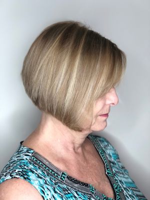 Women's haircut by Sam Smith at SamSmithStyle in Colorado Springs, CO 80911 on Frizo