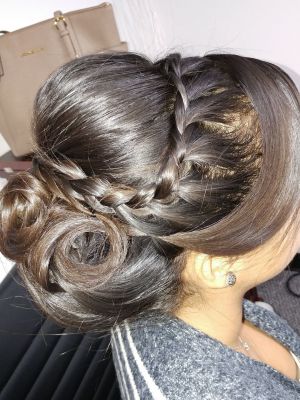 Updo by Kelly Melendres at Arlis Beauty Salon in Miami, FL 33155 on Frizo