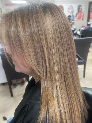 Keratin treatment by Julissa Tercero at Internation hair salon in Margate, FL 33063 on Frizo