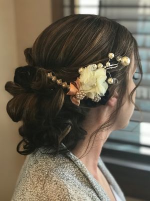 Updo by Karla Martinez at Bella donna salon & spa in Painesville, OH 44077 on Frizo