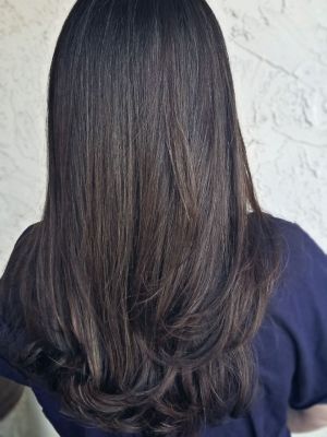 Women's haircut by Geovanna Ramos at Michael Joseph Salon And Spa in San Diego, CA 92128 on Frizo