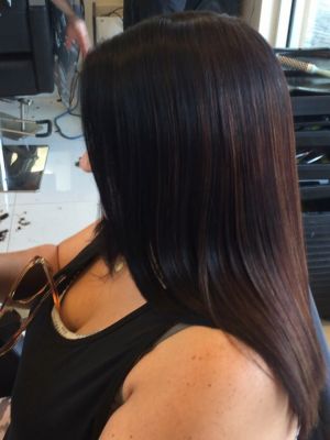 Keratin treatment by Christine Jiaconnie at Famous Hair Villa in Dania, FL 33004 on Frizo