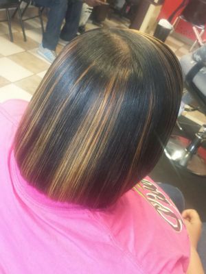 Partial highlights by D'Andrea Brown at Up And Beyond Salon in Indianapolis, IN 46202 on Frizo