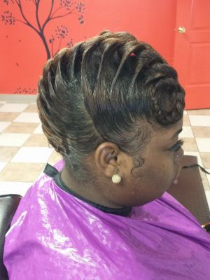 Updo by D'Andrea Brown at Up And Beyond Salon in Indianapolis, IN 46202 on Frizo