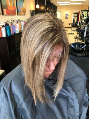 Partial highlights by Andrea Ramirez at Flaunt Salon in Altamonte Springs, FL 32714 on Frizo