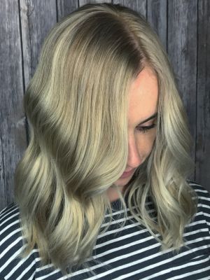 Partial highlights by Maddie Bertino at Mane Gallery Salon in Omaha, NE 68144 on Frizo