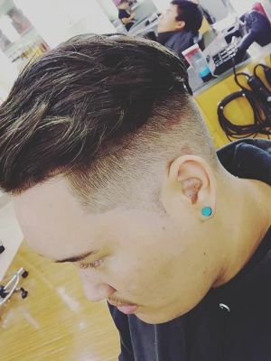 Men's haircut by Kapuanani Ho at Regis in Honolulu, HI 96814 on Frizo