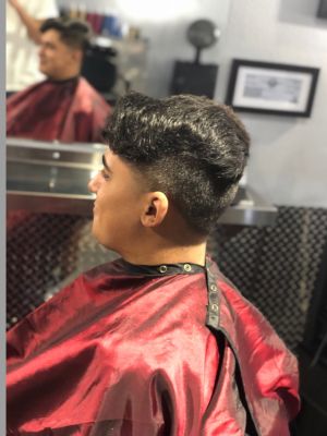 Men's haircut by Marcus Cuevas at Hair Goals in Modesto, CA 95355 on Frizo