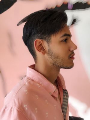 Men's haircut by Fleur Spratley at Hair by Fleur in Miami, FL 33180 on Frizo