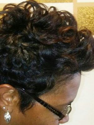 Relaxer by Marcella Hillman at Heiress Hair in Dallas, TX 75231 on Frizo