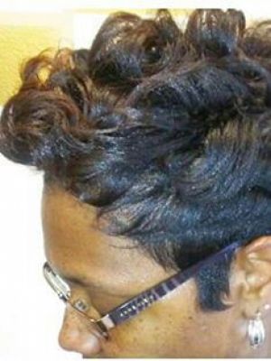 Relaxer by Marcella Hillman at Heiress Hair in Dallas, TX 75231 on Frizo